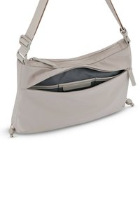 Light beige crossbody bag with adjustable strap, front zipper pocket partially open showing dark fabric interior and card slots.