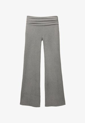 Grå brede bukser lavet af et struktureret stof. Har en samlet, strækbar talje. Materialet ser blødt og let ribbet ud.