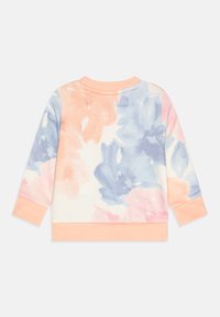 Felpa per bambini in tessuto morbido, con un motivo ad acquerello pastello in rosa e blu. Maniche lunghe e colletto e polsini a coste color pesca.