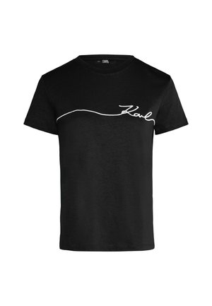 T-shirt en coton noir avec un logo script blanc brodé sur la poitrine. Texture lisse, design classique à col rond et manches courtes.