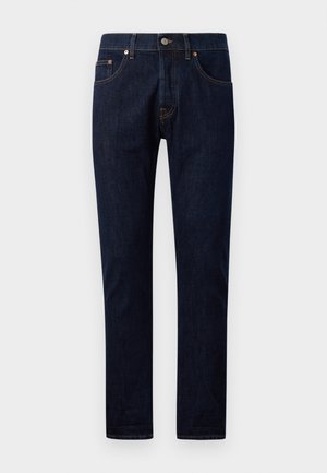 Mørkeblå denim jeans med slim fit, med fem lommer, kobber nitter og kontrasterende syninger langs sømmene. Glat tekstur.