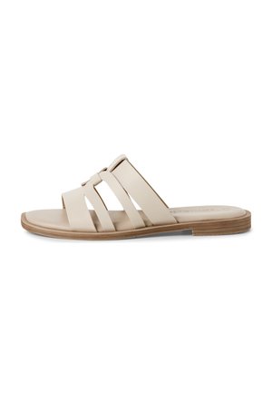 Beige slide sandal with three wide straps. Material appears smooth, with a flat, light brown sole and subtle stitching details.