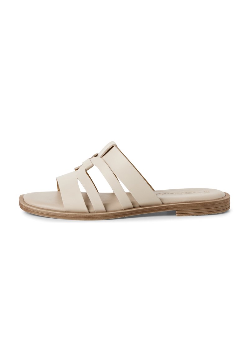 Beige slide sandal with three wide straps. Material appears smooth, with a flat, light brown sole and subtle stitching details.