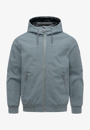 Jasnoniebieska kurtka z kapturem, zapinana na zamek z przodu, z kapturem ze sznurkiem, kieszeniami bocznymi na zamek, ściągaczami na mankietach i w pasie.