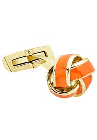 Goldplattierter Knotendesign mit glatten orangen Emaille-Akzenten. Abgerundete Form mit verschlungenen Elementen, glänzende Oberfläche.