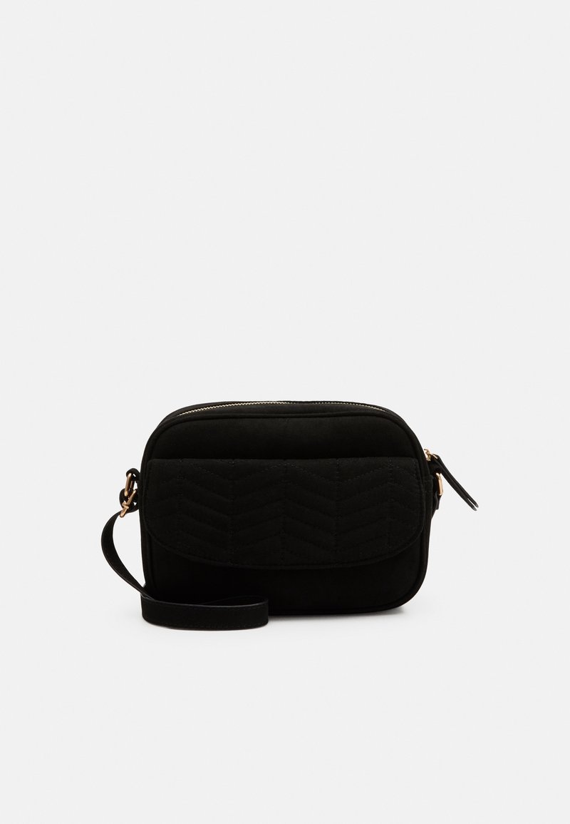 Black suede crossbody bag with a quilted chevron pattern, rectangular shape, gold hardware, and a single adjustable strap.