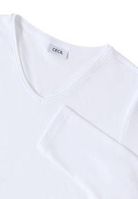 Weiße Langarm-V-Ausschnitt-Bluse aus weicher Baumwolle. Verfügt über ein kleines Etikett am Ausschnitt und genähte Nähte entlang der Kanten.