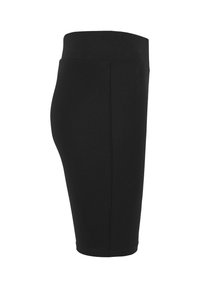 Jupe crayon noire longueur genou avec taille haute, montrée de côté sur fond blanc.