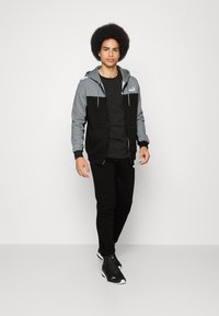 Puma HOODED COLORBLOCK SUIT SET - Chándal - black