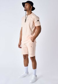 Project X Paris TECHNIQUE À DÉCOUPES - Camiseta estampada - pale peach