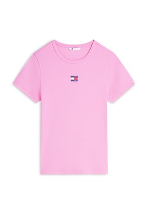 T-shirt rose côtelé à manches courtes avec col rond et petit logo Tommy Jeans centré sur la poitrine.