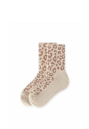 Paire de chaussettes beiges avec motif léopard marron clair sur les poignets et la partie supérieure du pied, à plat sur fond blanc.