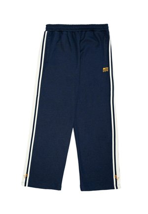 Marineblaue Jogginghosen mit weißen Seitenstreifen, elastischem Bund, zwei Seitentaschen und einem kleinen gelben Emblem am linken Bein.