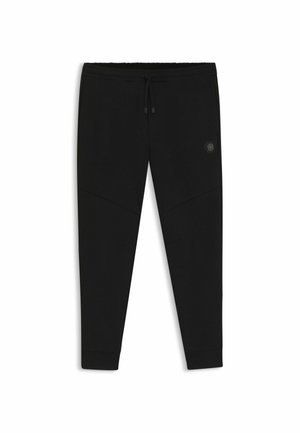 Svarta sportiga joggers gjorda av mjukt, stretchigt material. Har en dragsko i midjan, avsmalnande ben och vinklade sömmar. Hexagon-logotyp på låret.