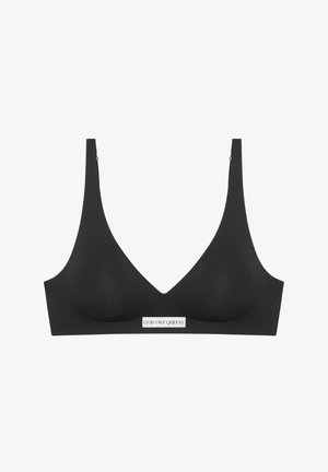 Czarny bezprzewodowy stanik o dekolcie w serek, gładkiej fakturze, szerokich ramiączkach oraz białej metce logo na środkowej części przodu. Bezszwowe wykończenie.