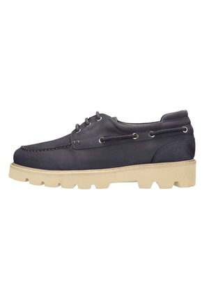 Marineblaue Lederbootsschuhe mit einer cremefarbenen Gummisohle, die über ein Schnürdesign, fünf Ösen und kontrastierende Nähte entlang der Nähte verfügt.