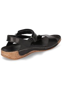 Schwarze Ledersandale mit Kreuzriemendesign, offenem Zeh und strukturiertem Korksohle. Verfügt über weiße Nähte und verstellbare Riemen für den perfekten Sitz.