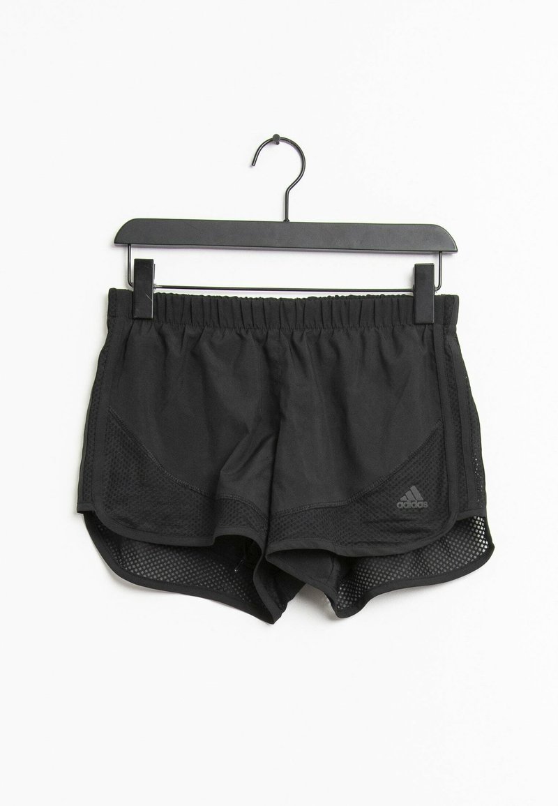 Svarta idrottsshorts med mesh sidopaneler, elastisk midja och integrerad innershorts. Har en liten logotyp på nedre vänstra sidan.