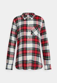 Langærmet flannelskjorte med et skjulte mønster i rød, grøn og hvid tartan, udstyret med en enkelt brystlomme og knap-ned krave.