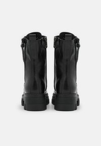 Marco Tozzi Platform ankle boots - black antic