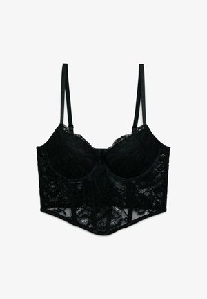 Reggiseno lungo in pizzo nero con coppe con ferretto e spalline sottili regolabili, con motivi floreali in pizzo su tutta la superficie.