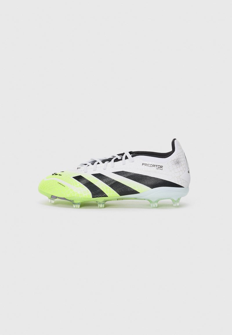 White football boot with black stripes and neon green accents. Textured upper with a distinct pattern. Clear sole with multiple studs.