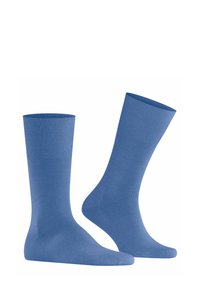 Zwei blaue Socken werden nebeneinander präsentiert, mit einem gerippten Bund und einem glatten Körper. Die Socken sind für den lässigen Gebrauch entworfen.