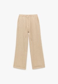 Pantalones de lino beige con un corte holgado, cintura elástica y cordón. Presenta bolsillos laterales y un tejido texturizado.