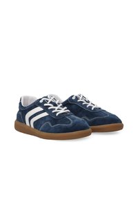 Navy suede sneakers with white side stripes, white laces, and a brown rubber sole. Features stitching accents and a rounded toe design.