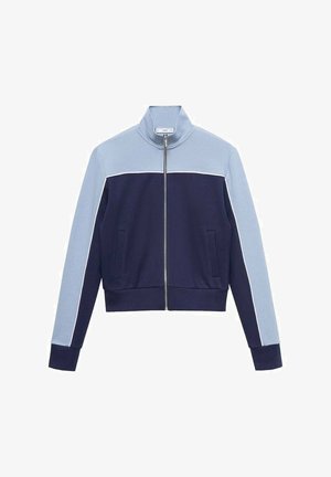 Světle modrá a námořnická modrá zipová bunda s stojáčkem a dvěma předními kapsami, s kontrastními horizontálními a barevnými bloky na rukávech.