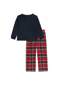 Marinefarbener Langarm-Top mit geripptem Textil, kombiniert mit roten karrierten Schlafanzughosen. Das Karomuster zeigt schwarze, grüne und weiße Akzente auf rotem Grund.