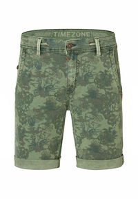 Green cotton shorts with floral camouflage print, rolled hem, back pockets, and brown button closure. Brand labeled inside waistband.