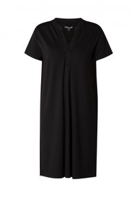 Zwarte jurk tot de knie met korte mouwen, een V-hals, en zijsplitten. Gemaakt van zachte, lichte stof. Eenvoudig, losse pasvorm.