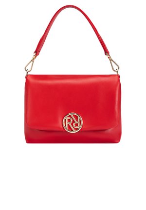 Red leather handbag with a smooth texture, featuring a gold circular logo on the front and a short, curved shoulder strap.