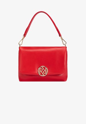 Red leather handbag with a smooth texture, featuring a gold circular logo on the front and a short, curved shoulder strap.