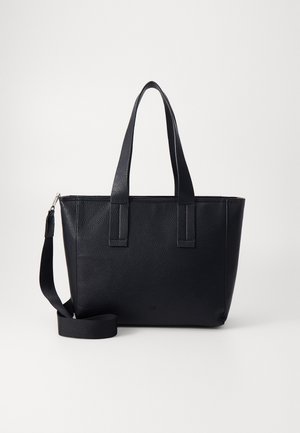 Sac cabas en cuir texturé noir avec deux poignées et une bandoulière réglable, debout sur un fond blanc uni.