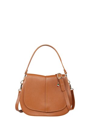 Tan leather handbag with a textured finish, curved shape, top handle, and adjustable shoulder strap featuring a small decorative charm.