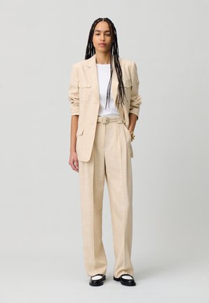 PEGGY - Pantalones - beige clair
