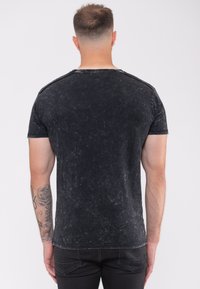 Paradiso Clothing GUNS N ROSES CLASSIC BAND LOGO SNOW WASH - Print T-shirt - black