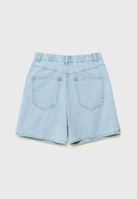 Light blue denim shorts with an elastic waistband. Features two back pockets and a relaxed fit, with visible stitching and folded hem.