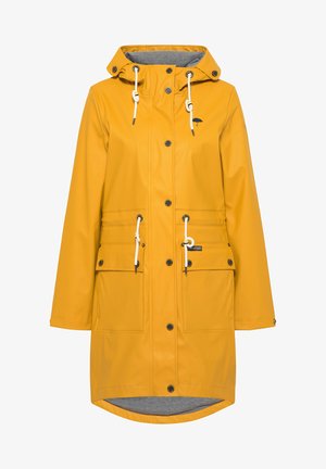 Keltainen vettähylkivä sadeenteinen takki, jossa on kiristettävä huppu, kaksi etutaskua ja harmaa vuori. Varustettu valkoisilla nyöreillä ja mustilla yksityiskohdilla.