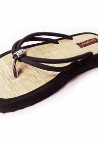 Black rubber flip-flop with a woven bamboo footbed, featuring a silver decorative accent on the thong strap and a textured sole.