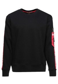 Felpa nera in misto cotone, con collo rotondo, maniche lunghe e tasca laterale con zip. Nastro di colore rosso corre lungo le maniche.