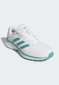 Weißer Sportschuh mit türkisfarbenen Akzenten. Verfügt über drei türkisfarbene Streifen, ein strukturiertes Obermaterial, einen gepolsterten Kragen und eine Gummisohle mit sichtbaren Traktionsstollen.