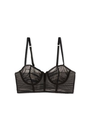 Soutien-gorge balconnet en mesh noir avec armatures, bonnets transparents, bretelles réglables et fermeture à crochets dans le dos.