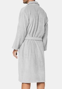 Gray bathrobe made of soft, textured fabric, featuring a shawl collar, long sleeves, and a waist tie, with side pockets.