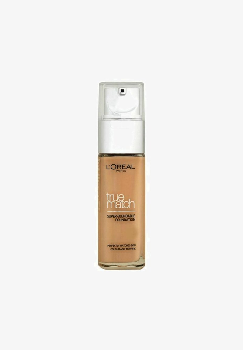 L'Oréal True Match-foundation i en transparent flaska med en vit pump, som innehåller en beige flytande formula. Etiketten inkluderar produktinformation.