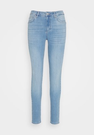 Lysblå slim-fit jeans lavet af denim, med klassisk fem-lomme design, lynlås for og en subtil falmning på lårerne.