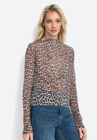 Leopard print long-sleeve top with a fitted design. Sheer, lightweight fabric; round neckline; slightly gathered at the waist.