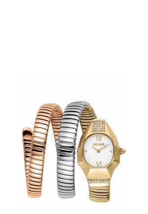 Bracelets métalliques en spirale en or, argent et or rose avec une montre dorée présentant un cadran blanc texturé et des accents en cristal.